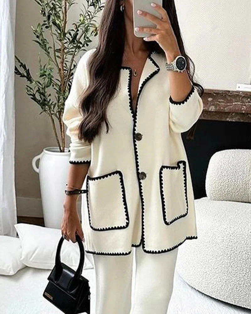 Conjunto de dos piezas compuesto por una chamarra decorada con líneas y un pantalón informal - Image 4