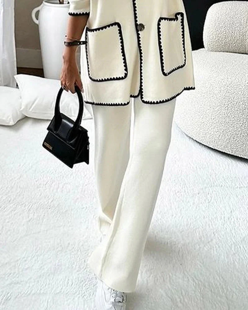 Conjunto de dos piezas compuesto por una chamarra decorada con líneas y un pantalón informal - Image 5
